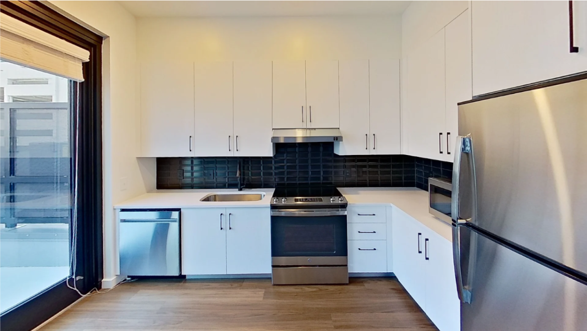 Example of lower countertop heights featured in an accessible unit.